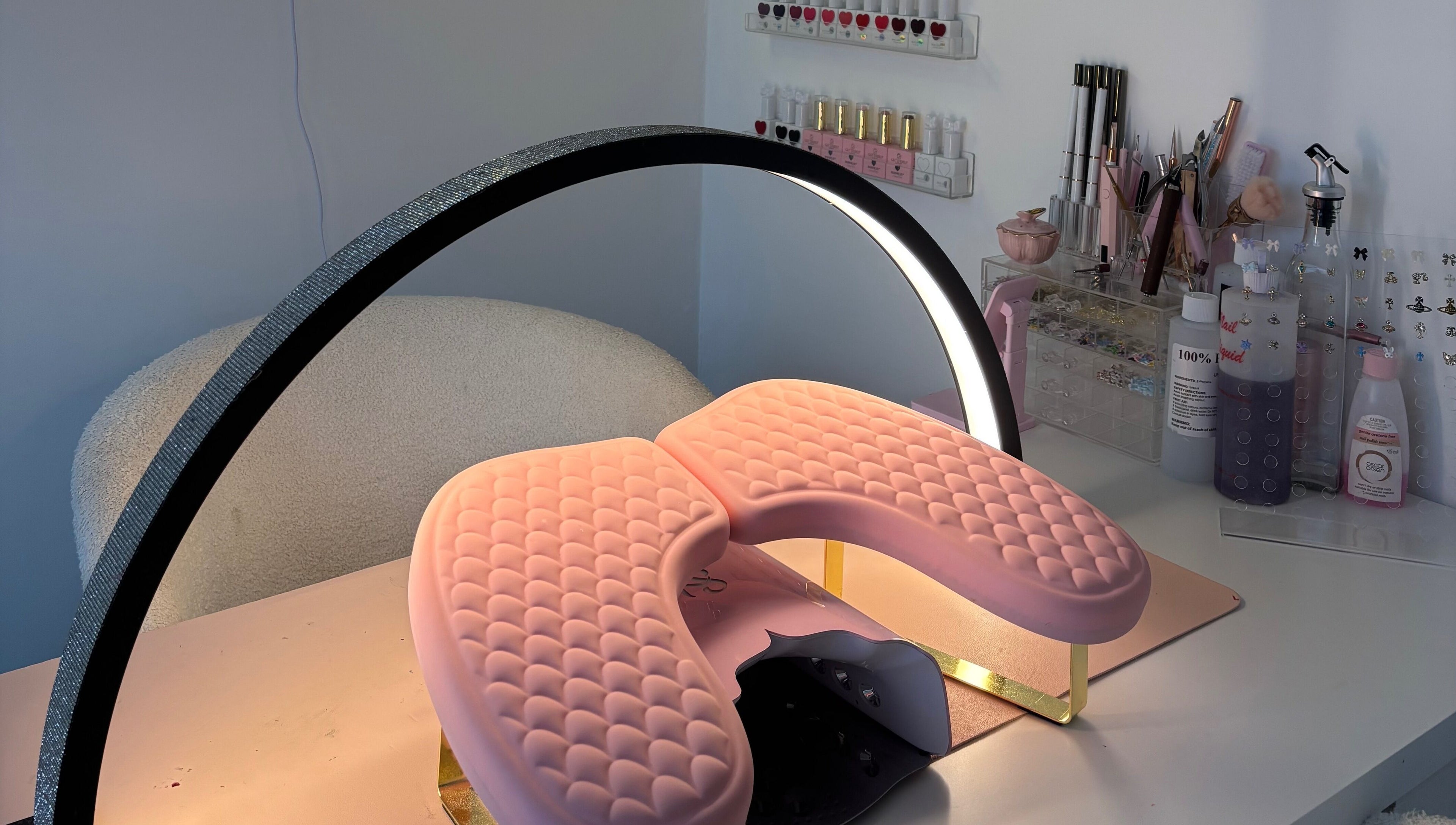 Elegant nail station at Coquette Charm Nail Salon in Cedar Vale, Queensland, AU, showcasing chic tools and polish.