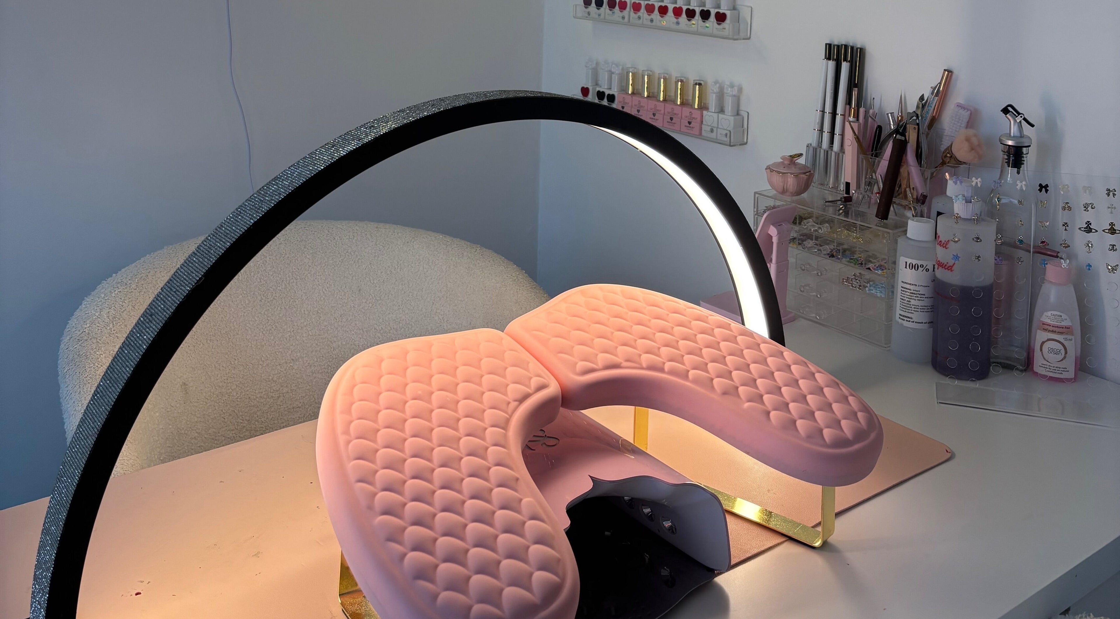 Elegant nail station at Coquette Charm Nail Salon in Cedar Vale, Queensland, AU, showcasing chic tools and polish.