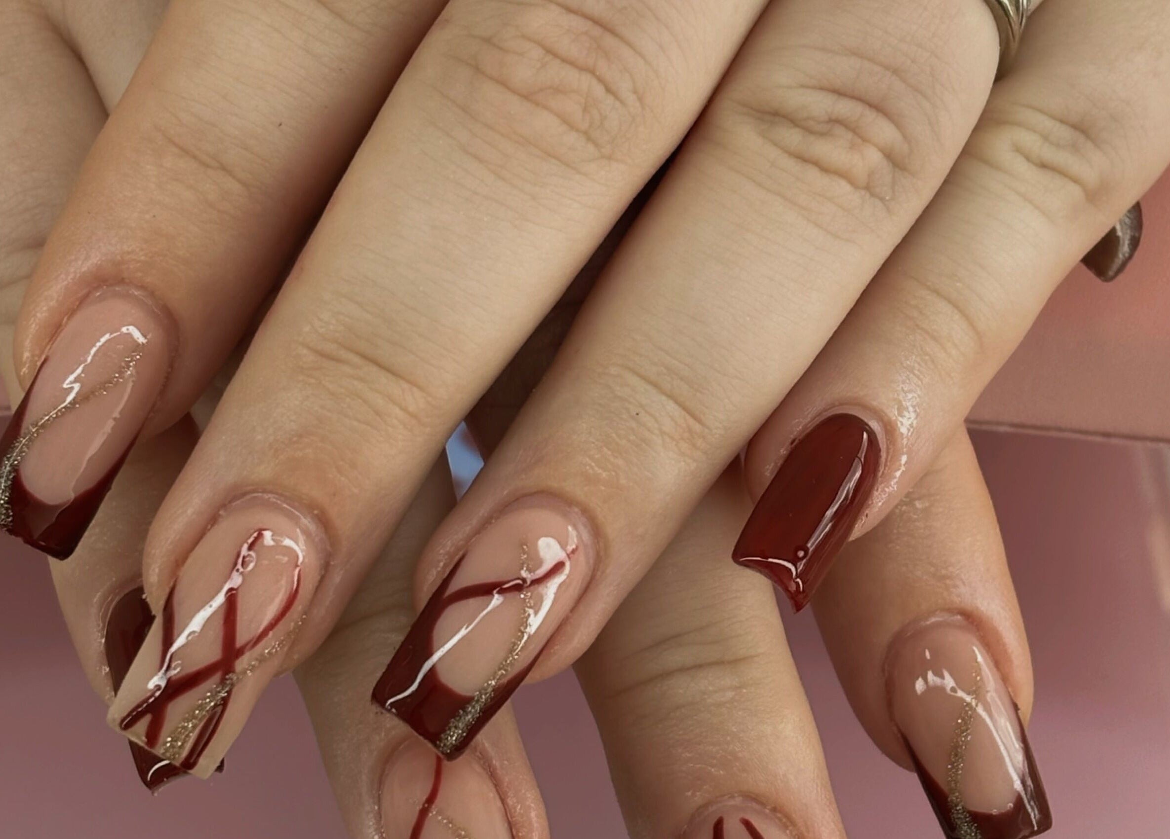 Stylish nail art at Coquette Charm Nail Salon, Cedar Vale, Queensland, AU, featuring intricate designs.