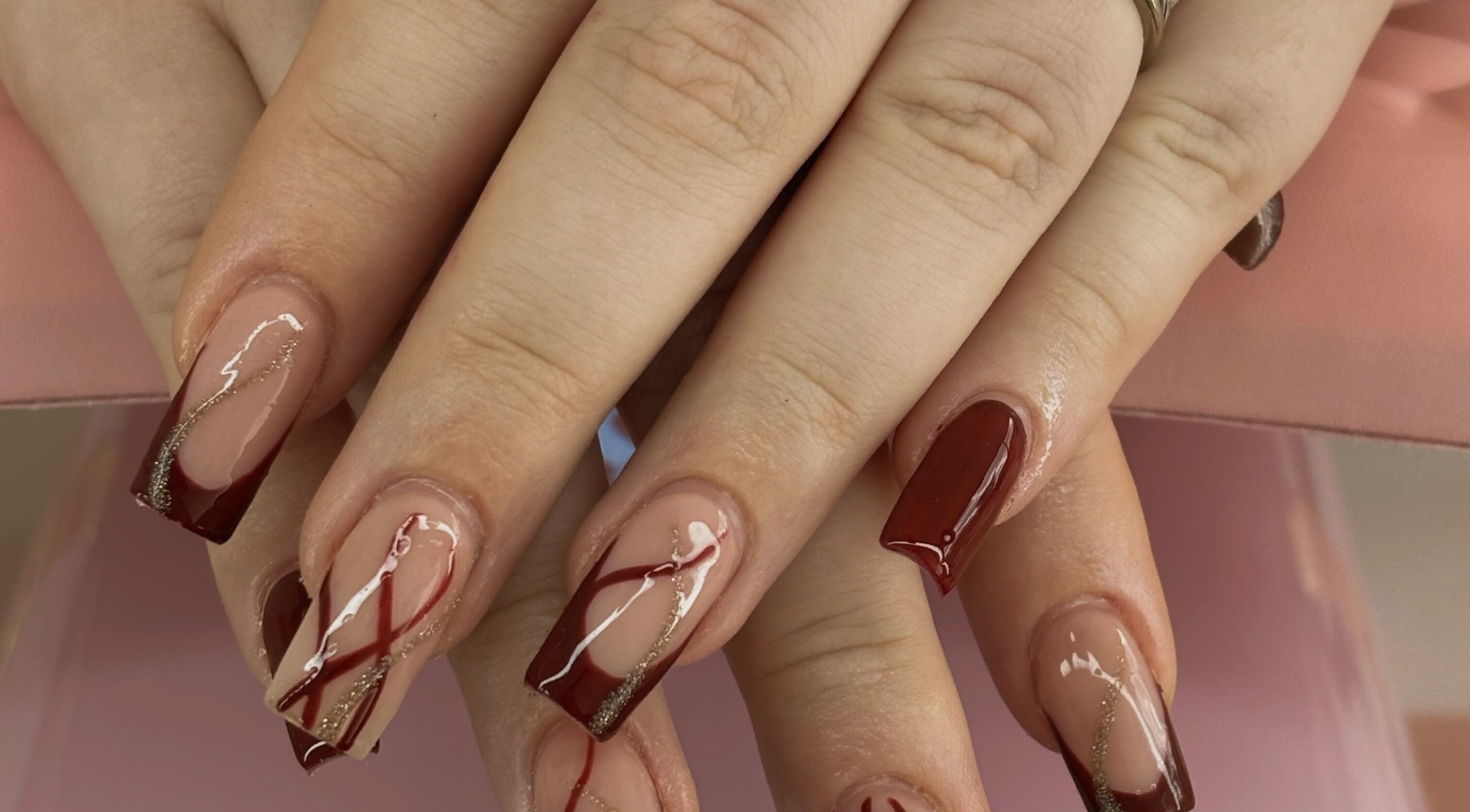 Stylish nail art at Coquette Charm Nail Salon, Cedar Vale, Queensland, AU, featuring intricate designs.