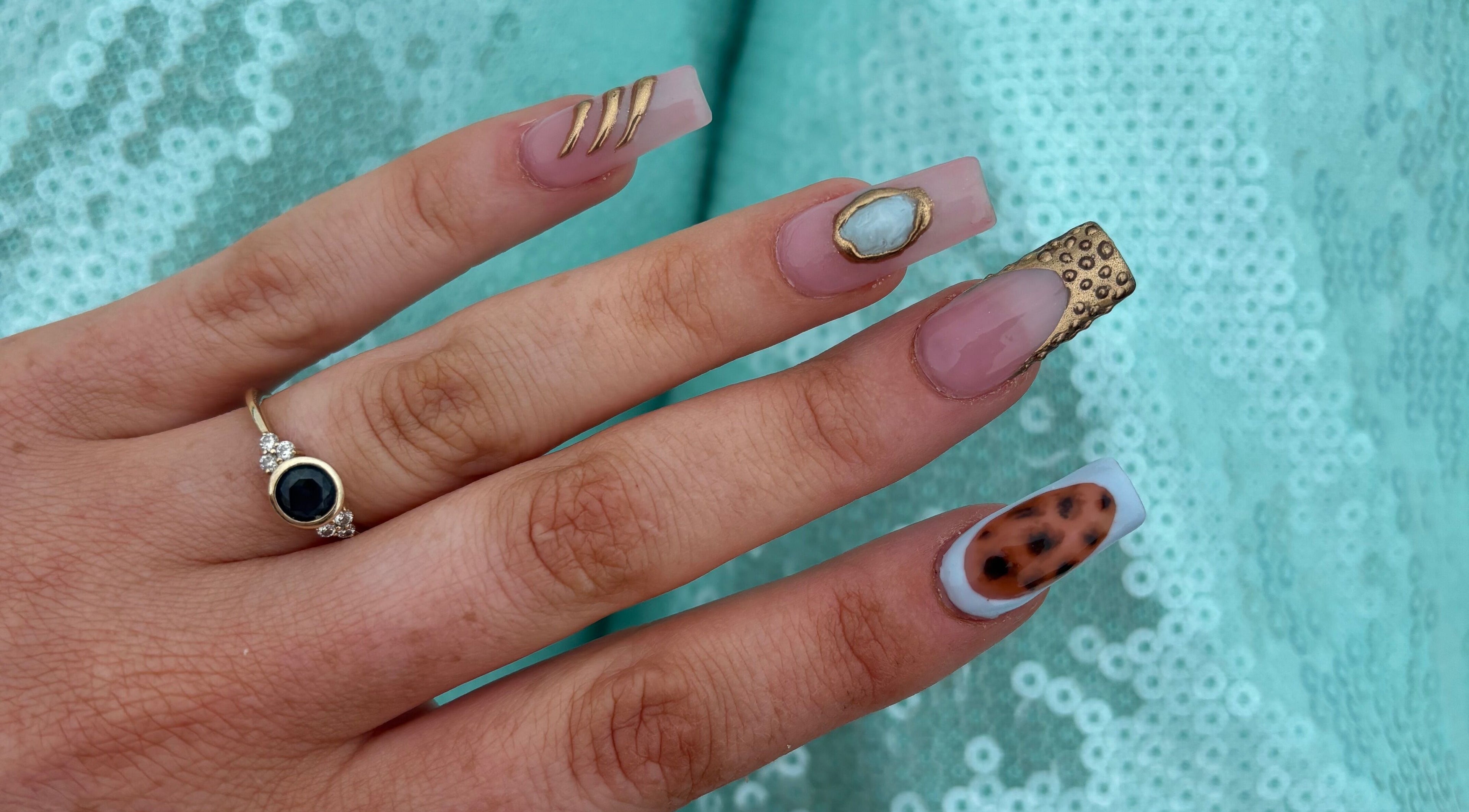 Elegant nail art at Coquette Charm Nail Salon, Cedar Vale, Queensland, AU showcasing intricate designs.