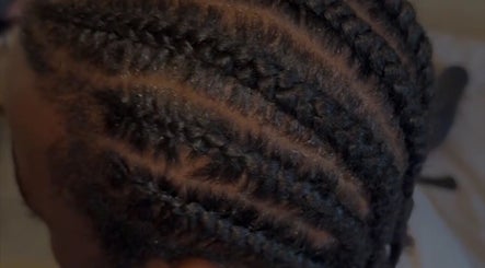 Stylish cornrows at Slayedbyajblacc, Bristol, England, GB. Expertly crafted intricate braids for all occasions.