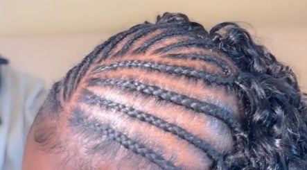 Intricate braided hairstyle at Slayedbyajblacc, Bristol, England, GB. Showcase of expert hair styling.