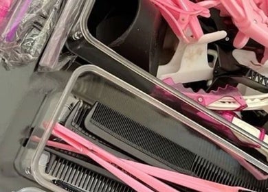 Slayedbyajblacc, Bristol, England, GB: Hair tools and colorful clips for styling at the salon.
