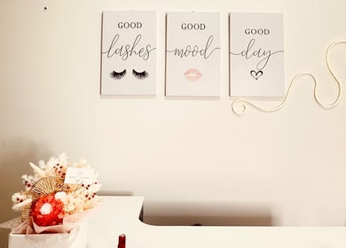 Elegant wall decor with lash-themed quotes at Sweetie Lash, Moorebank, New South Wales, AU.