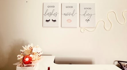 Elegant wall decor with lash-themed quotes at Sweetie Lash, Moorebank, New South Wales, AU.