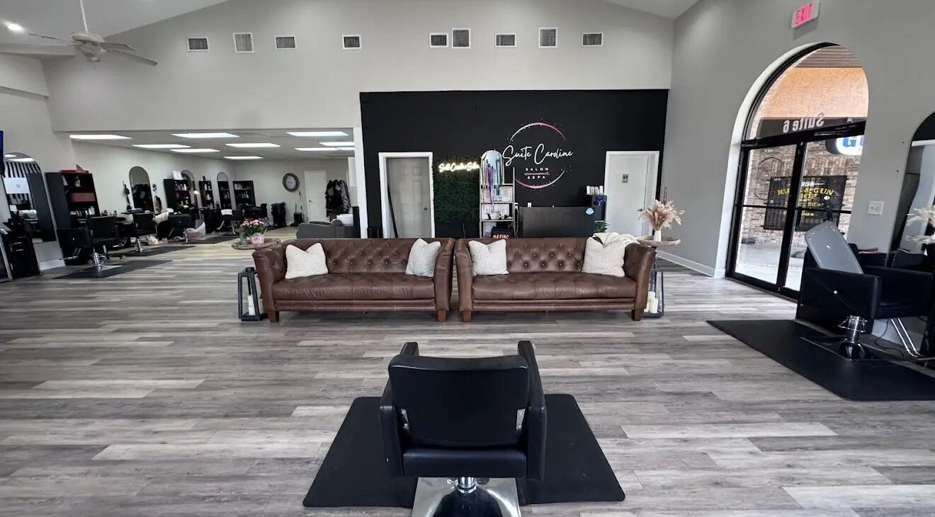 Spacious interior of Elovie Beauty LLC in Titusville, Florida, US featuring modern decor and comfortable seating.