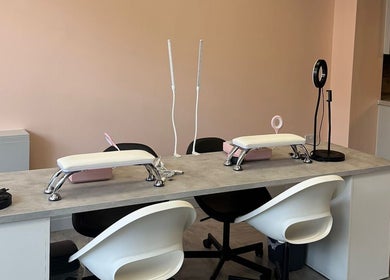 Modern nail station at The Beauty Bar Liverpool, Liverpool, England, GB. Sleek design with elegant lighting.