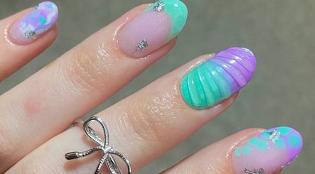 Colorful gel nail art at Pears Gels, Durham, England, GB showcasing intricate designs and vibrant colors.