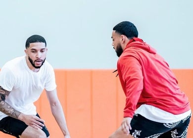 Two men engaged in an intense training session at Winning Culture, Miami, Florida, US.