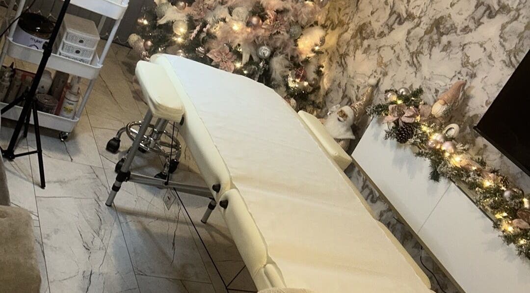 Peaceful treatment room at Beauty by Lacey x in Rochdale, England, GB, featuring a festive decor.