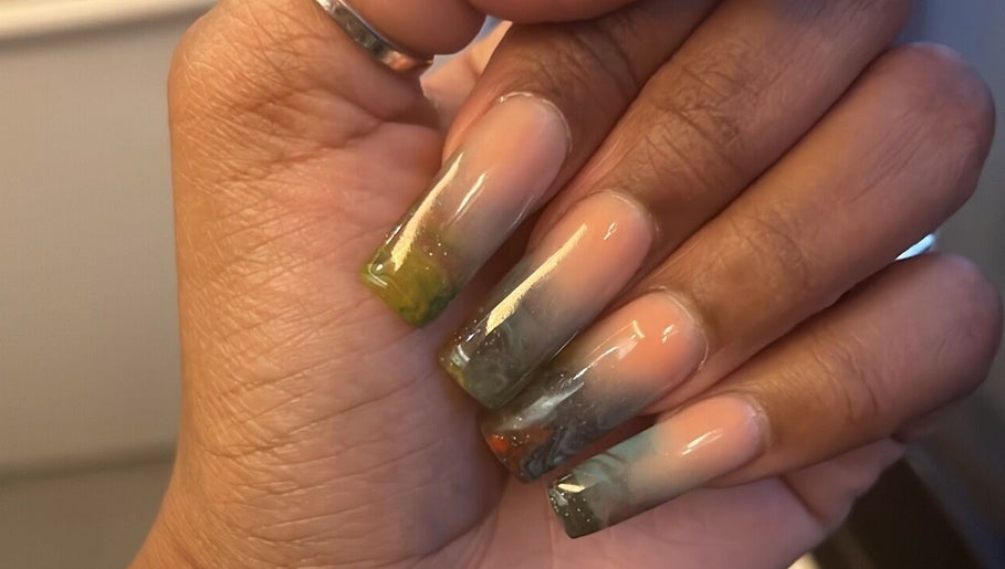 Elegant gradient nails at Lu_Nailedit, Sheffield, England, GB showcasing artistic manicure.