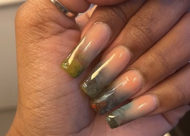Elegant gradient nails at Lu_Nailedit, Sheffield, England, GB showcasing artistic manicure.