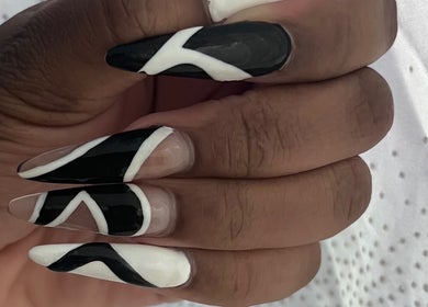 Elegant black and white nail art at Lu_Nailedit, Sheffield, England, GB.
