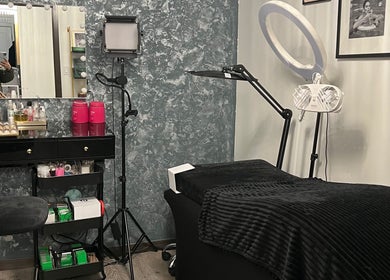 Luxurious interior of Zoe Lashes NYC, New York, New York, US, featuring beauty equipment and stylish decor.