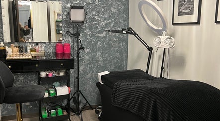 Luxurious interior of Zoe Lashes NYC, New York, New York, US, featuring beauty equipment and stylish decor.