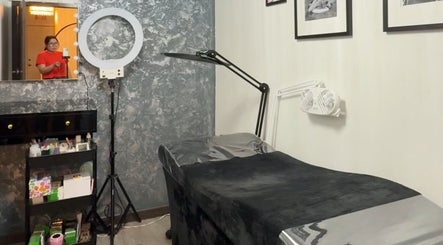 Cozy lash extension room at Zoe Lashes NYC, New York, New York, US, featuring professional tools and decor.