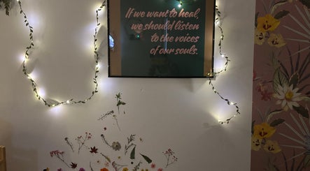 Inspirational quote on a lit wall at A.M.B.E.R Aromatherapy and Massage, Dalkeith, Scotland, GB.