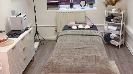 Relaxing treatment room at Glow Method Crawley, Crawley, England, GB, showcasing serene decor and cozy ambiance.