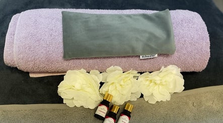 Relaxing spa setup with lavender towel and oils at Glow Method Crawley, Crawley, England, GB.