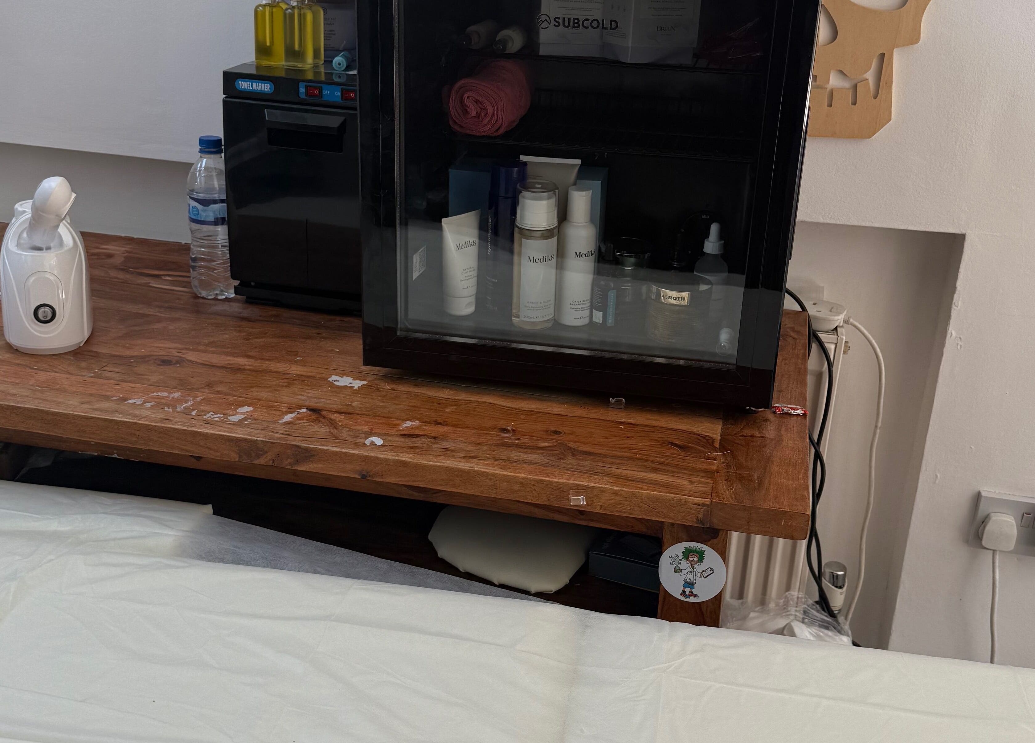 Lilly’s Beauty LDN spa equipment in London, England, GB including skincare products and a facial steamer.