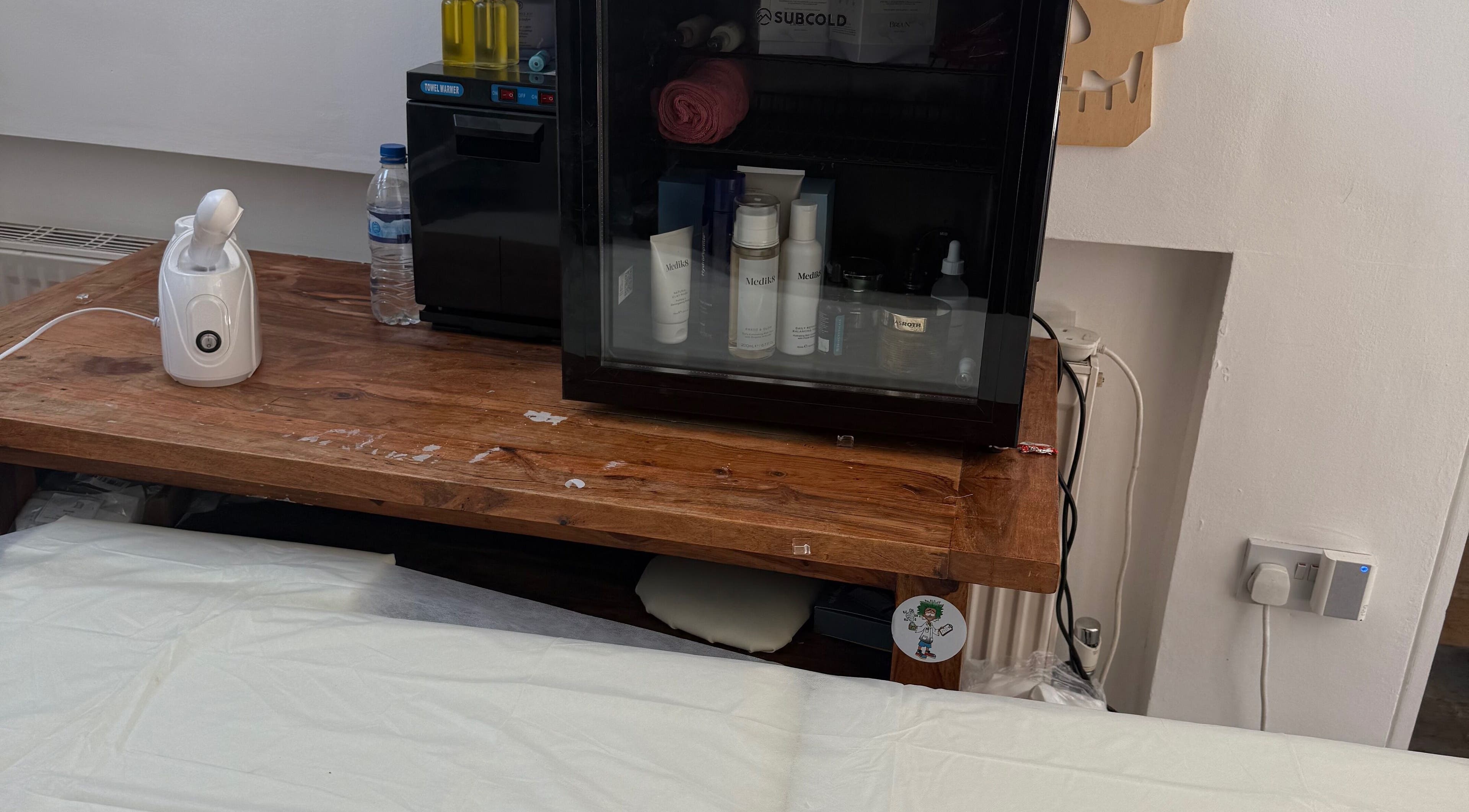 Lilly’s Beauty LDN spa equipment in London, England, GB including skincare products and a facial steamer.