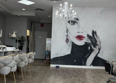 Elegant interior of Laque Nail Bar in Vancouver, British Columbia, CA, featuring stylish decor and plush seating.
