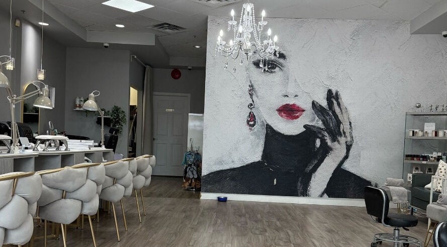 Elegant interior of Laque Nail Bar in Vancouver, British Columbia, CA, featuring stylish decor and plush seating.