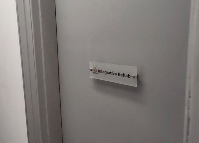 Entrance door labeled RENEWAL INTEGRATIVE REHAB at Southampton, England, GB.