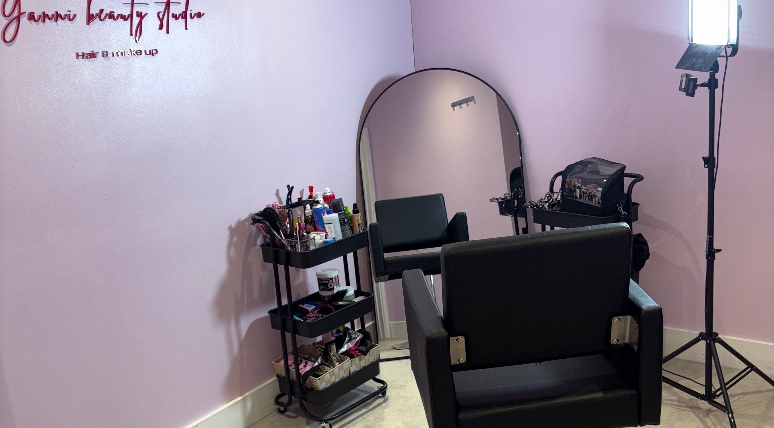 Modern salon chair and mirror setup at Yannibeautystudio, London, England, GB. Perfect for hair and makeup services.