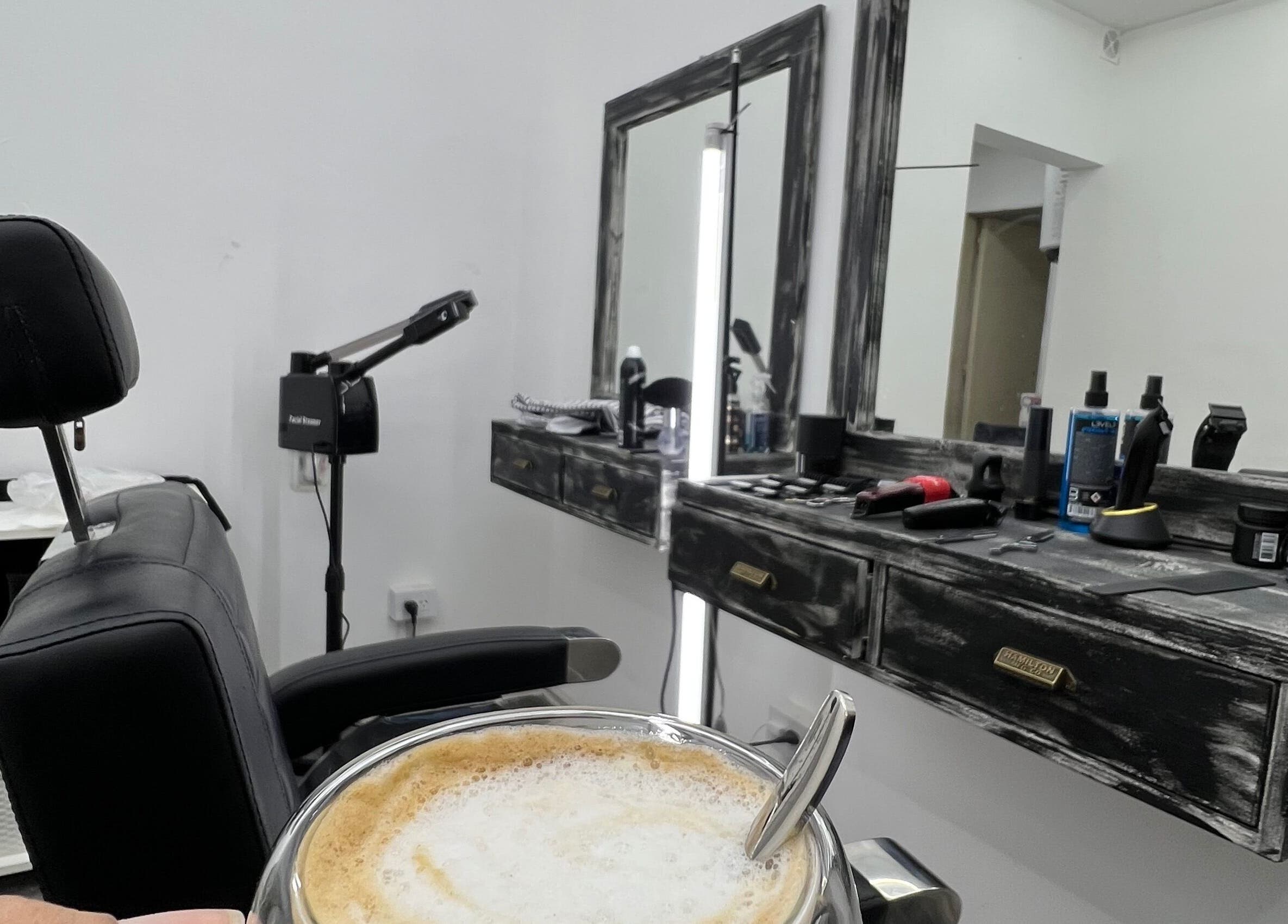 Espacio acogedor en 2000 Studio, Buenos Aires, Ciudad Autónoma De Buenos Aires, AR, con asiento y café.