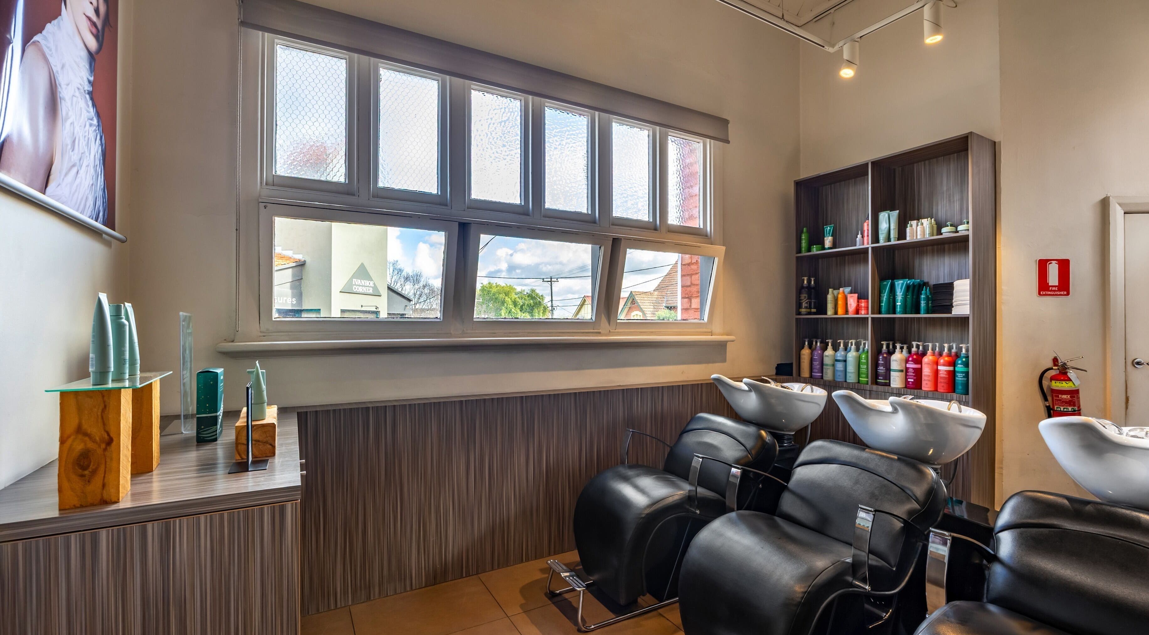 Comfortable salon area at Zucci Ivanhoe with sleek wash stations, Melbourne, Victoria, AU.