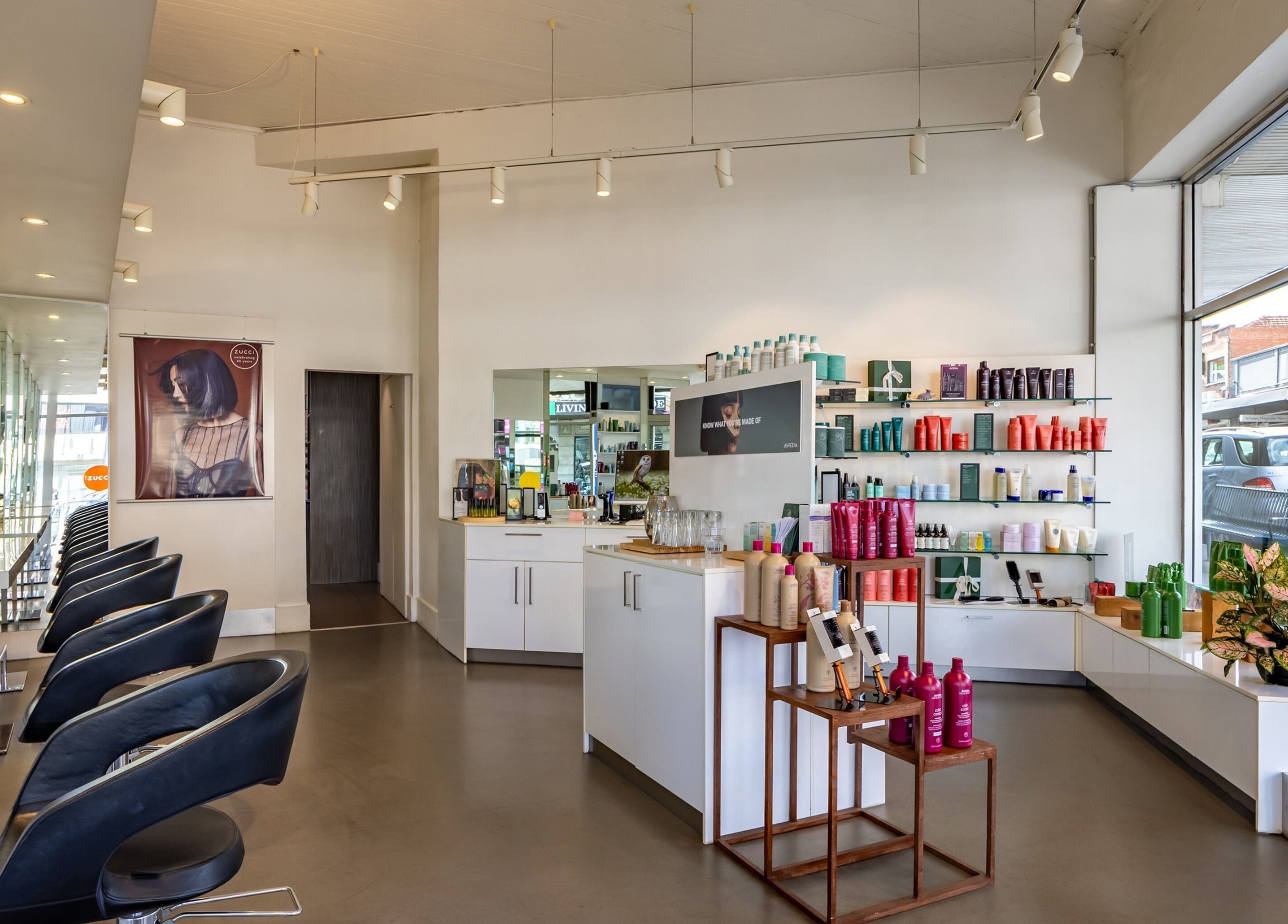 Interior of Zucci Ivanhoe, Melbourne, Victoria, AU, showcasing modern chairs and product displays.