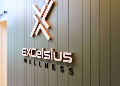 Excelsius Wellness entrance signage in Forest Glen, Queensland, AU displaying a modern logo design.