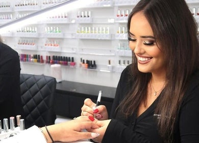 Nail artist perfects manicure at Krystina Beauty Studio, Hamilton, Waikato Region, NZ. Discover beauty excellence.