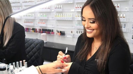 Nail artist perfects manicure at Krystina Beauty Studio, Hamilton, Waikato Region, NZ. Discover beauty excellence.