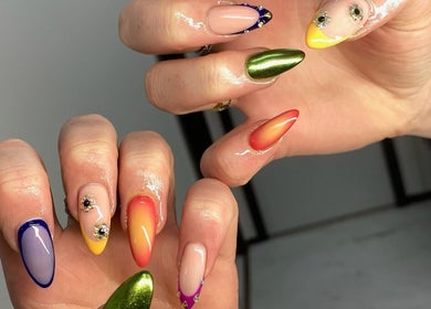 Stylish multicolored nail art at Krystina Beauty Studio in Hamilton, Waikato Region, NZ.