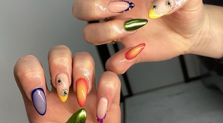 Stylish multicolored nail art at Krystina Beauty Studio in Hamilton, Waikato Region, NZ.