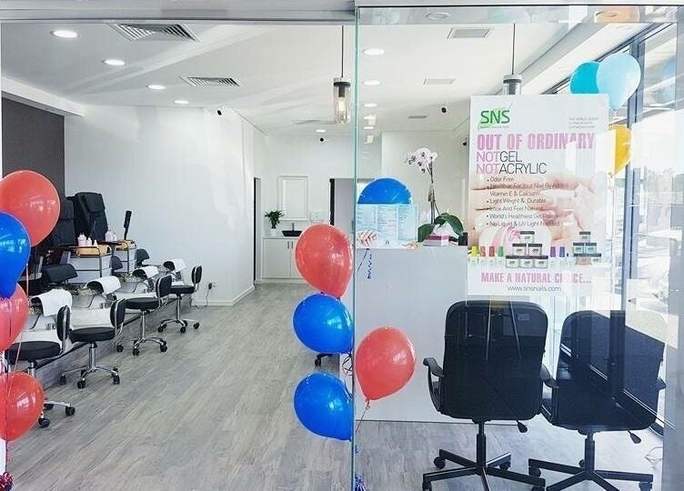 Stylish entrance of P&H Crystal Nails and Beauty in Bertram, Western Australia, AU with colorful balloons.