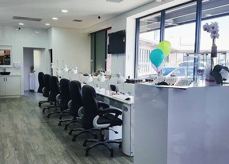 Chic interior of P&H Crystal Nails and Beauty, Bertram, Western Australia, AU with modern nail stations and decor.