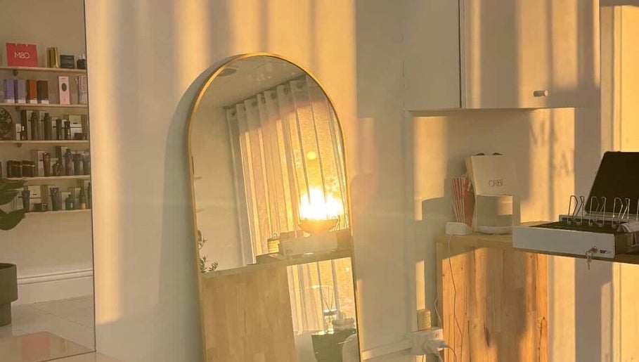 Warm sunset lighting at Hair by Chloe Shaye, Diamond Creek, Victoria, AU, enhancing salon's serene ambiance.