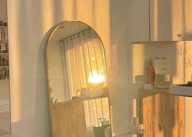 Warm sunset lighting at Hair by Chloe Shaye, Diamond Creek, Victoria, AU, enhancing salon's serene ambiance.