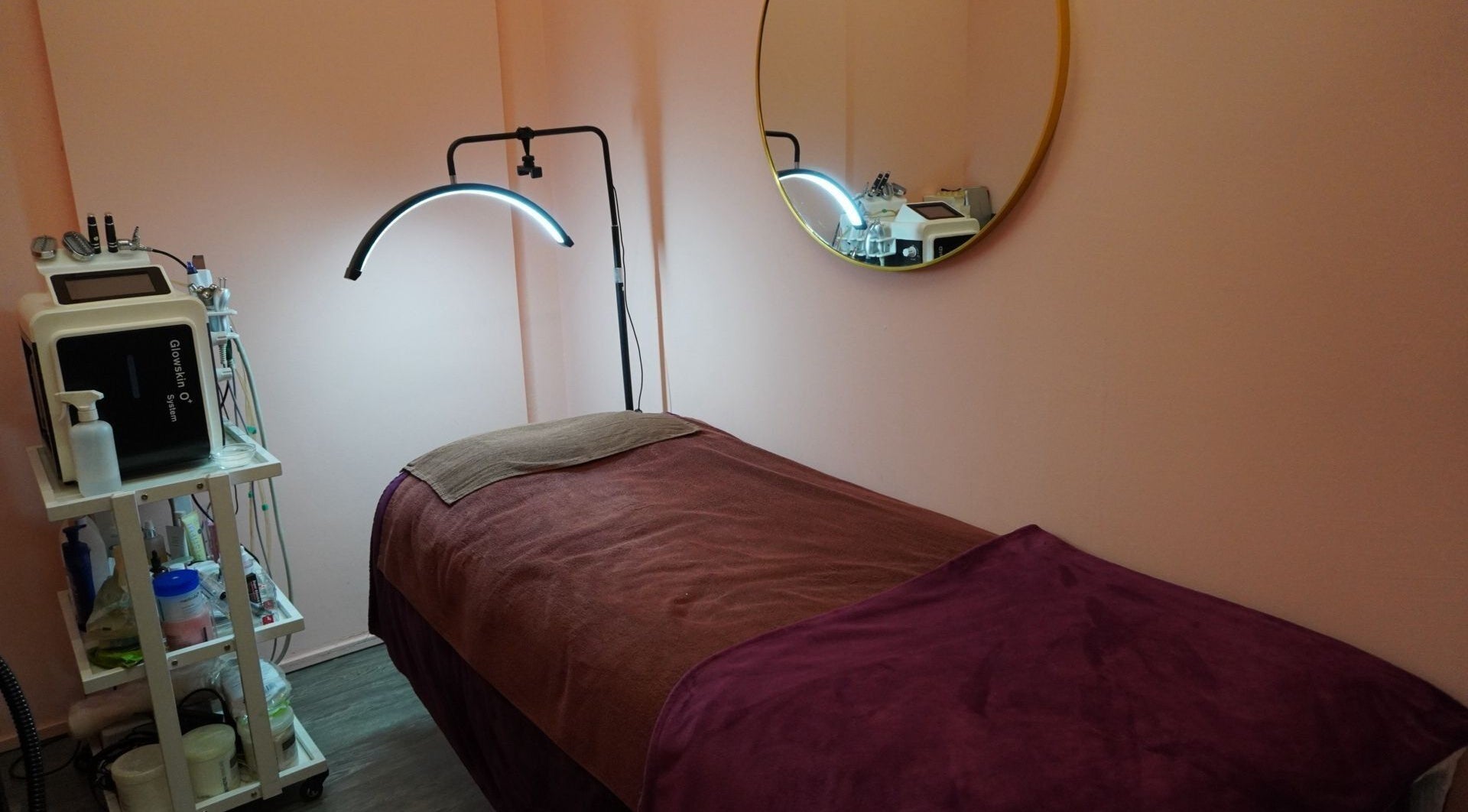 Cozy treatment room at M-plified Beauty by Malini Michelle, Singapore, Singapore, SG, featuring a therapy bed.