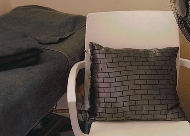 Cozy seating area at Bontlebotse Beauty, Boksburg, Gauteng, ZA, featuring a stylish black cushion.