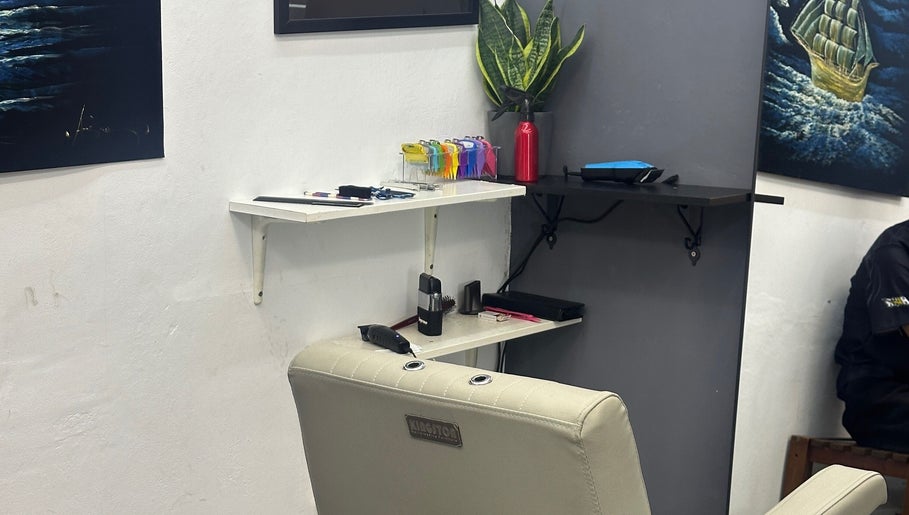 Comfortable barber chair and tools at Nul’s Barbershop in Batu Caves, Selangor, MY, creating a welcoming space.