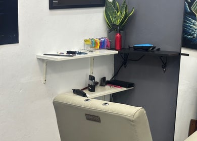 Comfortable barber chair and tools at Nul’s Barbershop in Batu Caves, Selangor, MY, creating a welcoming space.
