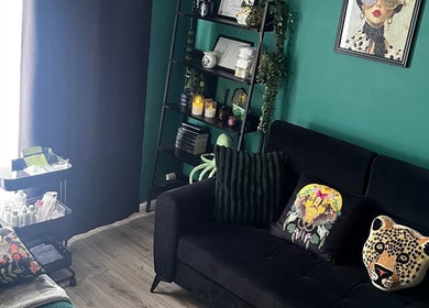 Stylish interior of Rachel Lily aesthetics & skincare, Bedworth featuring chic decor and comfy seating.