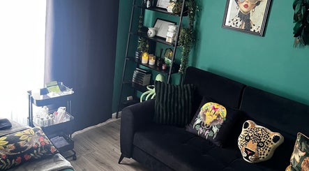 Stylish interior of Rachel Lily aesthetics & skincare, Bedworth featuring chic decor and comfy seating.