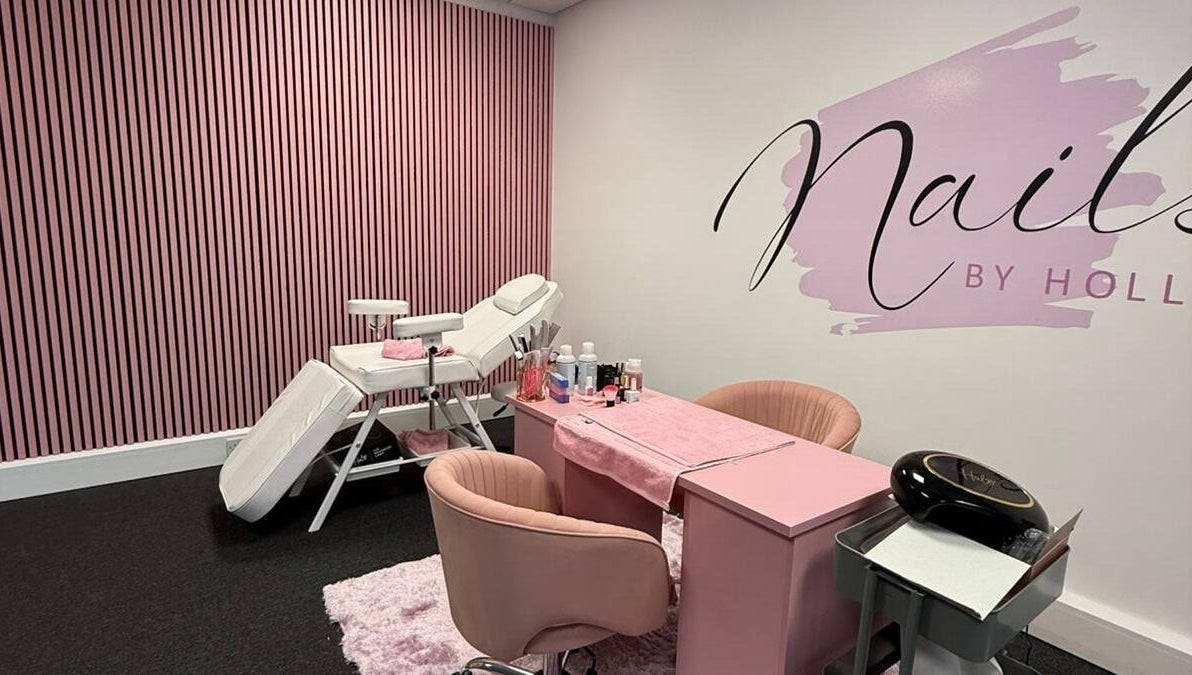 Chic interior of Nails By Holly in Great Blakenham, England, featuring a pink-themed manicure station.