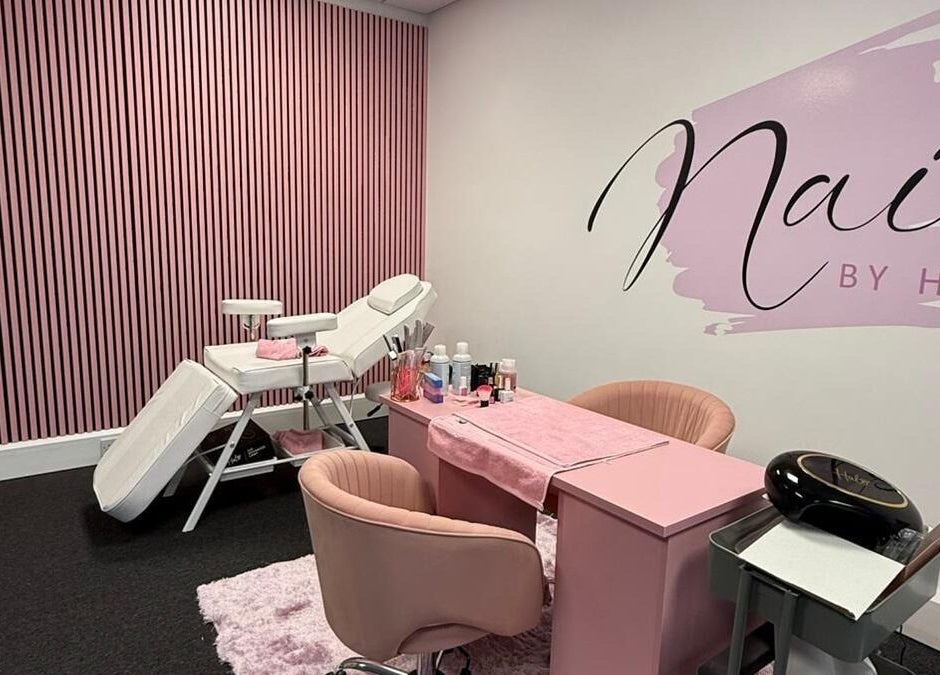 Chic interior of Nails By Holly in Great Blakenham, England, featuring a pink-themed manicure station.